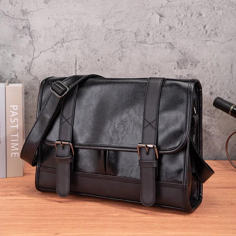 Black Korean style men's anti-theft commuter backpack with PU material and sewing thread design