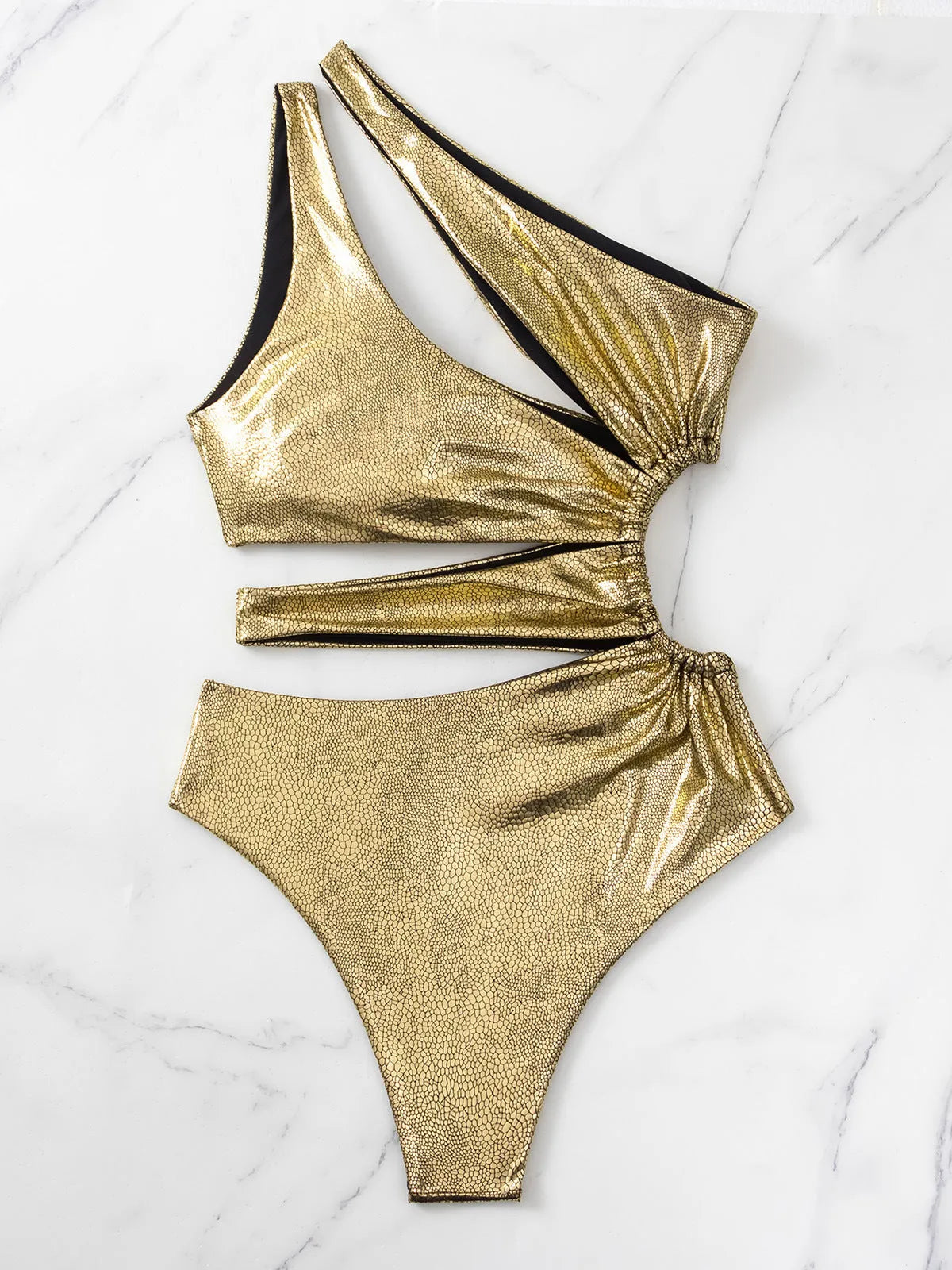Women's gold backless one-piece swimsuit on hanger showing sleeveless design and solid colour