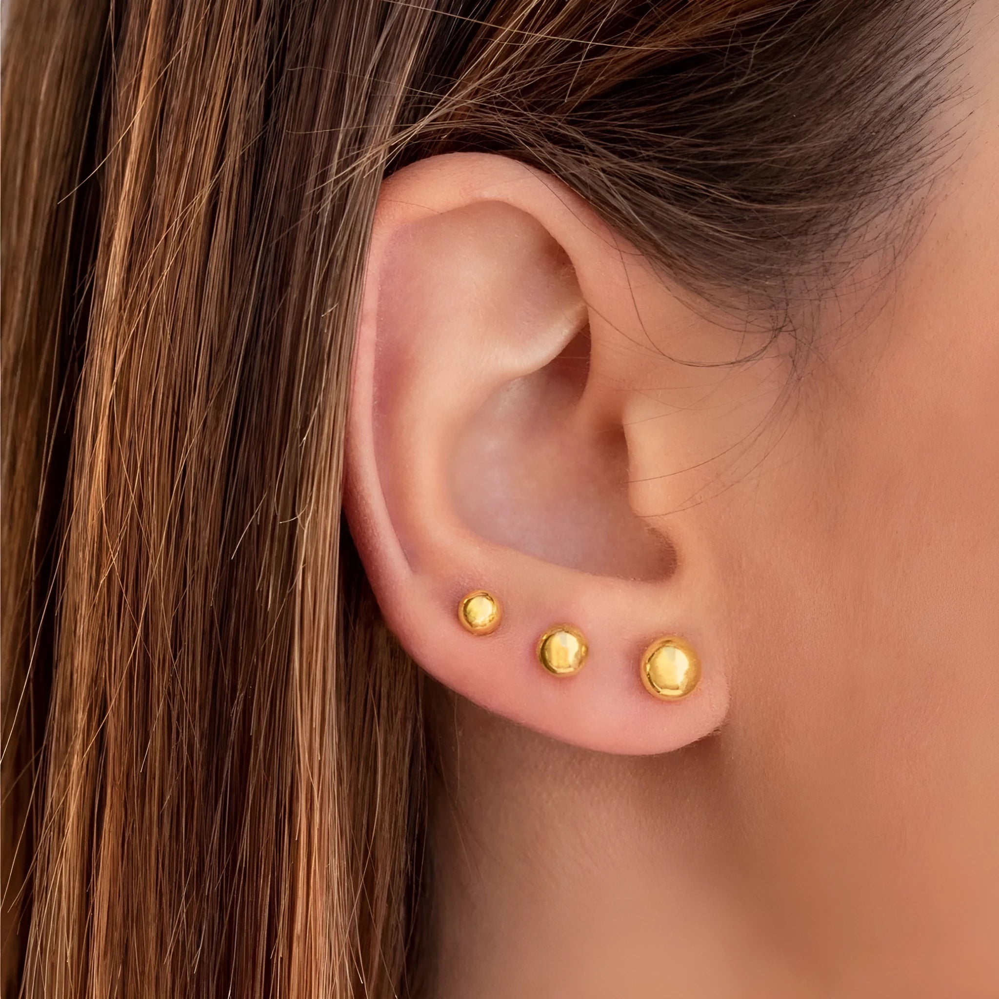 Stainless steel ball stud earrings in geometric round design with gold electroplating