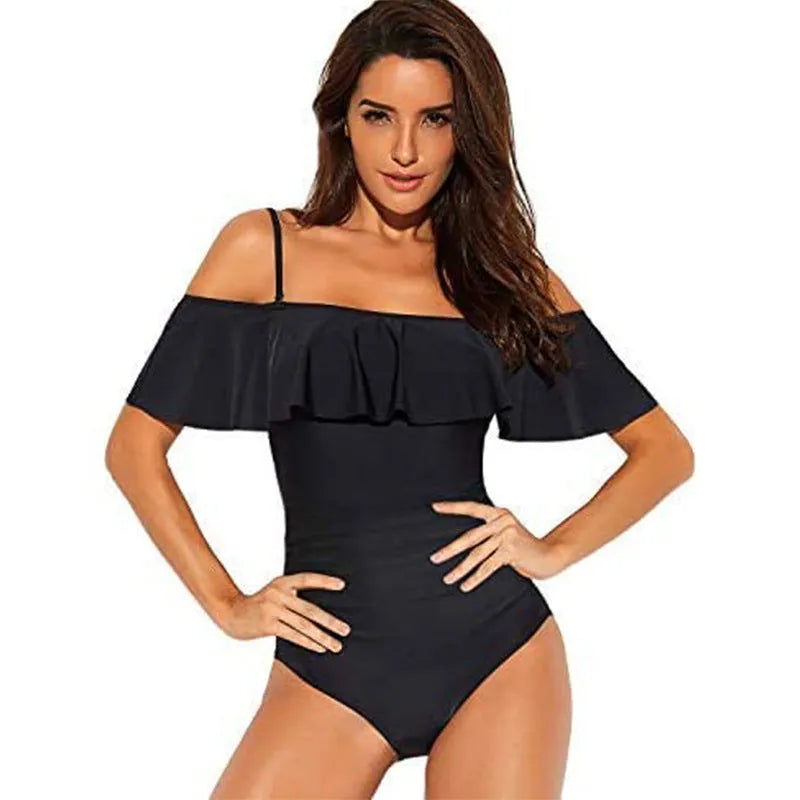 Black one-piece swimsuit with cut-out design and ruffled strap tube top
