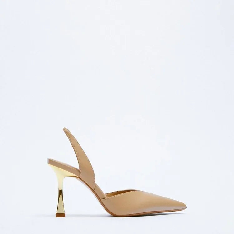 Patent leather pointed toe high heels in nude apricot colour with shallow mouth design
