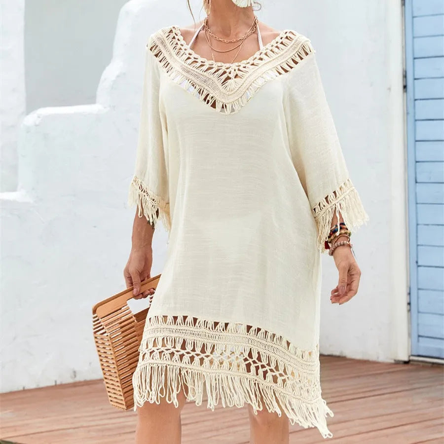 Apricot coloured women's crocheted knitted patchwork beach dress with mid-length skirt and half sleeves