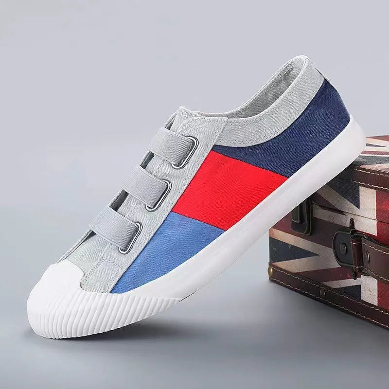 Men's canvas sneakers in multiple colours with elastic band closure and vulcanised rubber soles