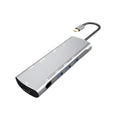 Grey USB-C docking station with HDMI, VGA, USB 3.0 and charging ports