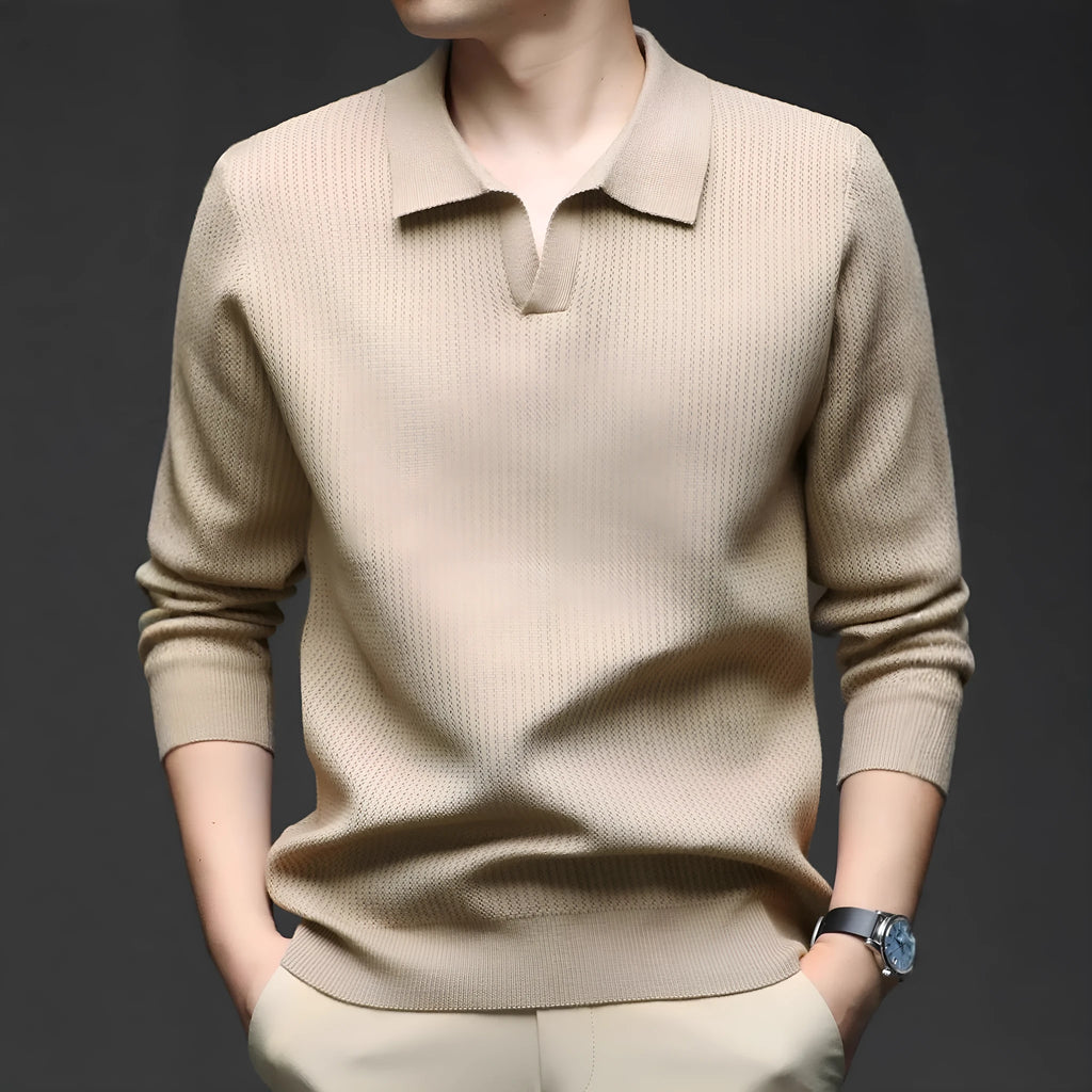 Man wearing a loose-fit green casual pullover sweater for autumn leisure.