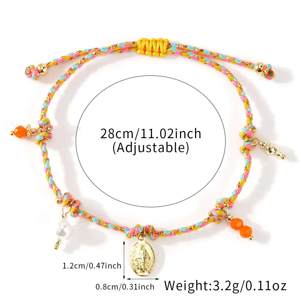 Close-up of a hand-woven colourful braided rope bracelet with an adjustable strap tag closure.