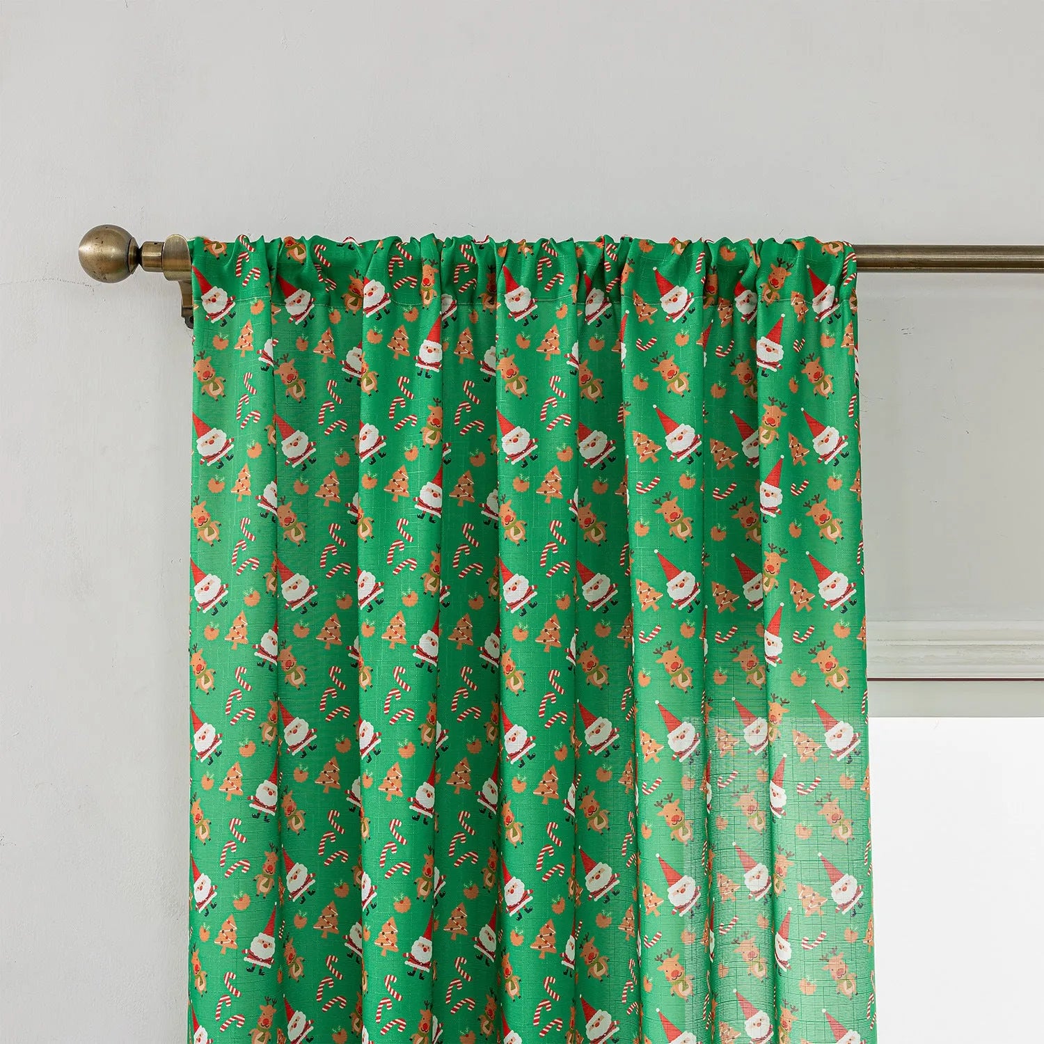 Green Christmas curtain with printed snowman and angel cartoon figures for window decoration