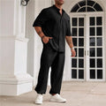 Men's apricot coloured cotton linen casual short-sleeved shirt and trouser set laid flat.