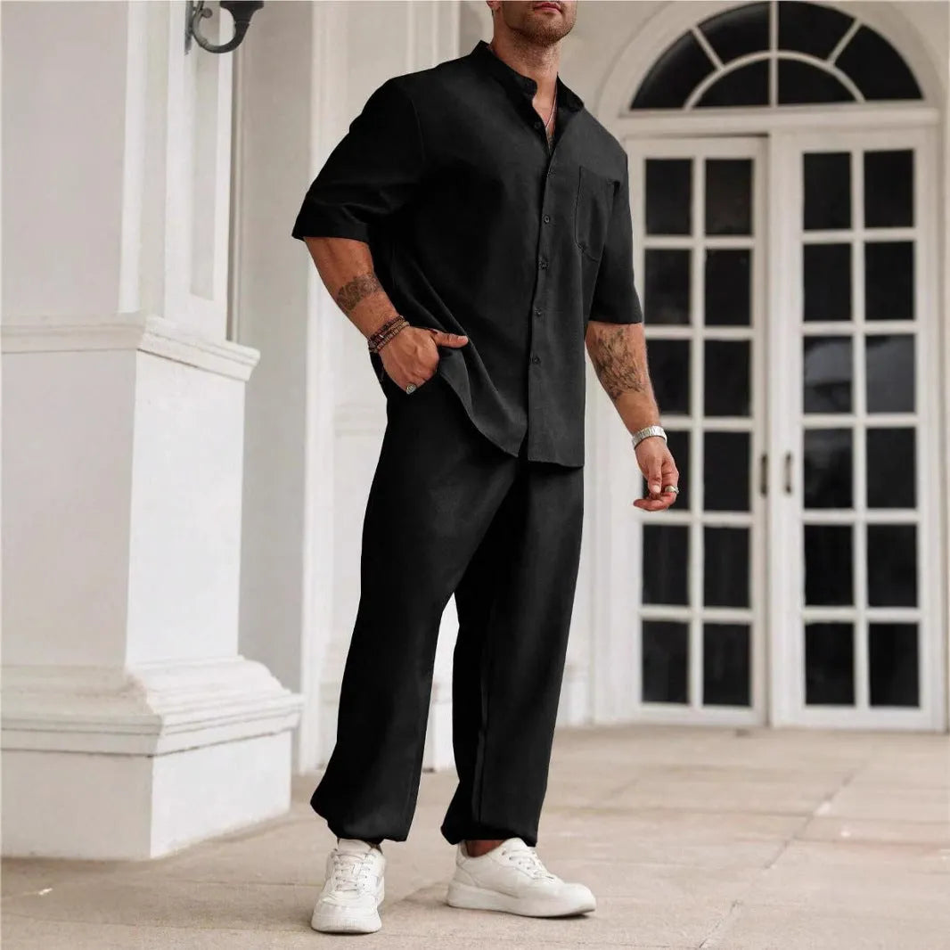 Men's apricot coloured cotton linen casual short-sleeved shirt and trouser set laid flat.