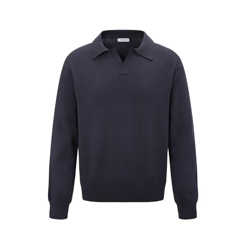 Man wearing a loose black acrylic blend pullover bottoming shirt for casual leisure wear.