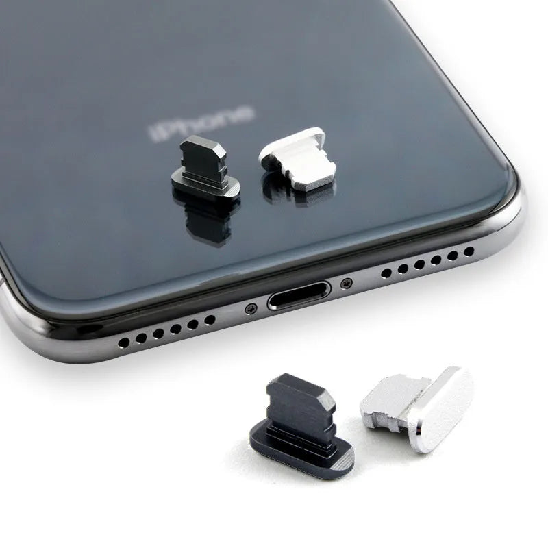 Aluminium alloy charging port dust plug for iPhone in various colours including gold, silver, blue, and rose gold.