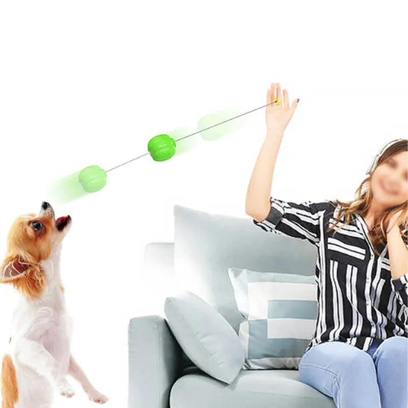 Green, orange, and yellow plastic pumpkin-shaped dog toy with squeaker for small dogs