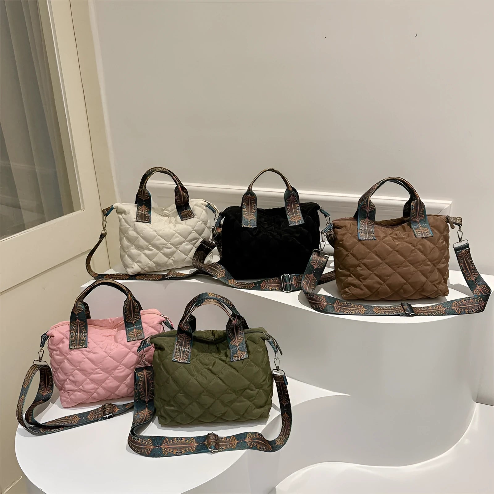 Soft Oxford cloth messenger bag with embroidery details and internal phone pocket in horizontal square shape