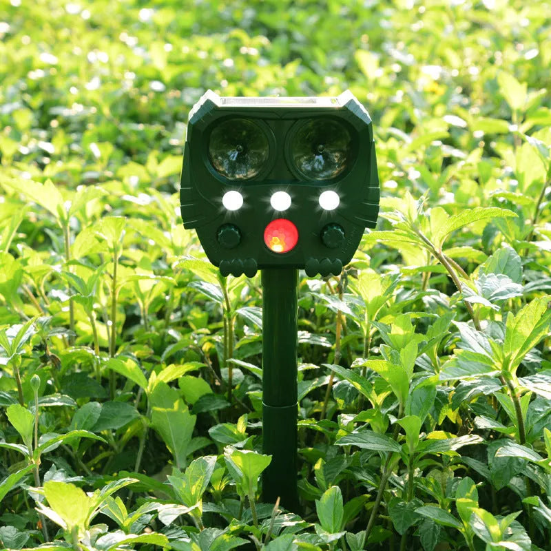 Green solar ultrasonic animal repeller device with outdoor mounting