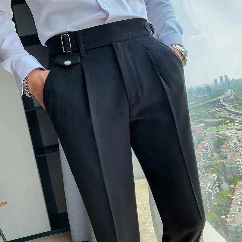 Men's straight leg casual trousers in solid colours including black and grey on a hanger.