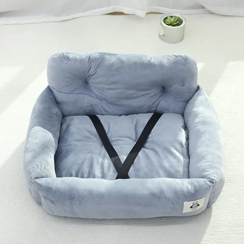 Car-mounted pet travel nest in stain-resistant cloth with grey or blue plaid options