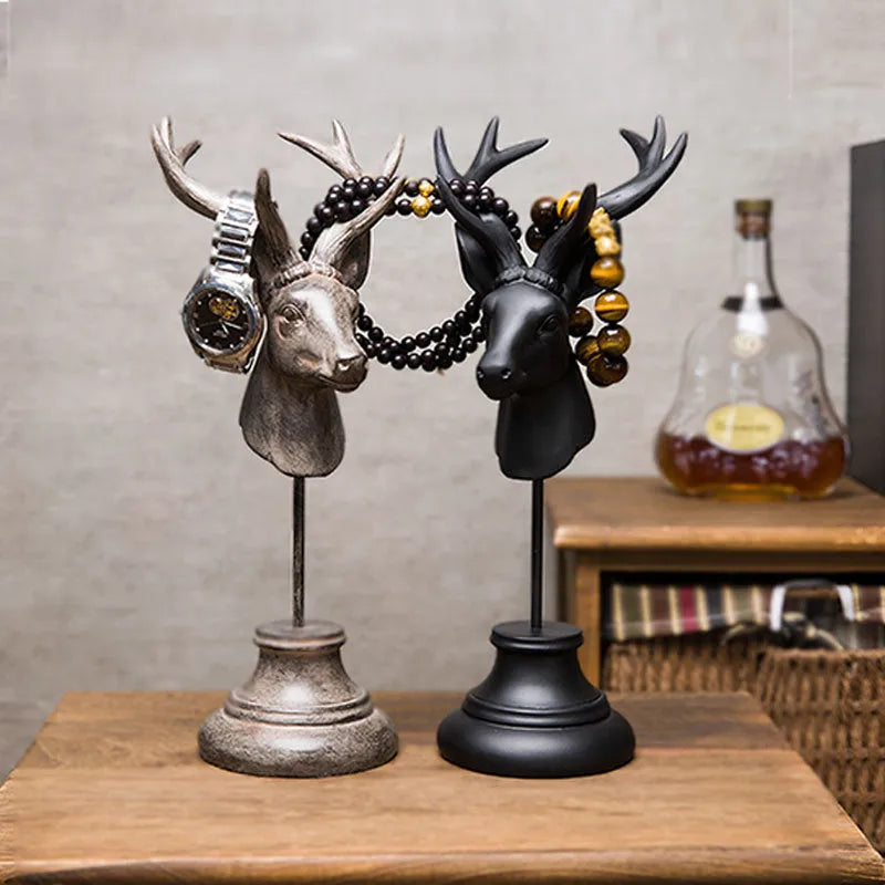 A solid natural resin animal sculpture for home decoration in black, white, or wood colour.