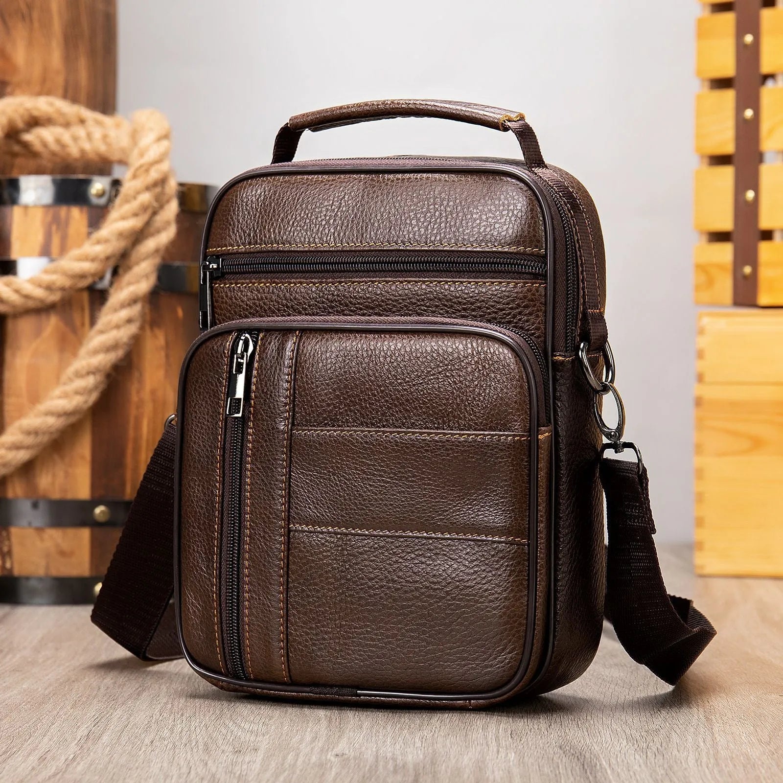 Men's vintage cowhide leather shoulder bag in vertical square design with zipper opening and soft handle