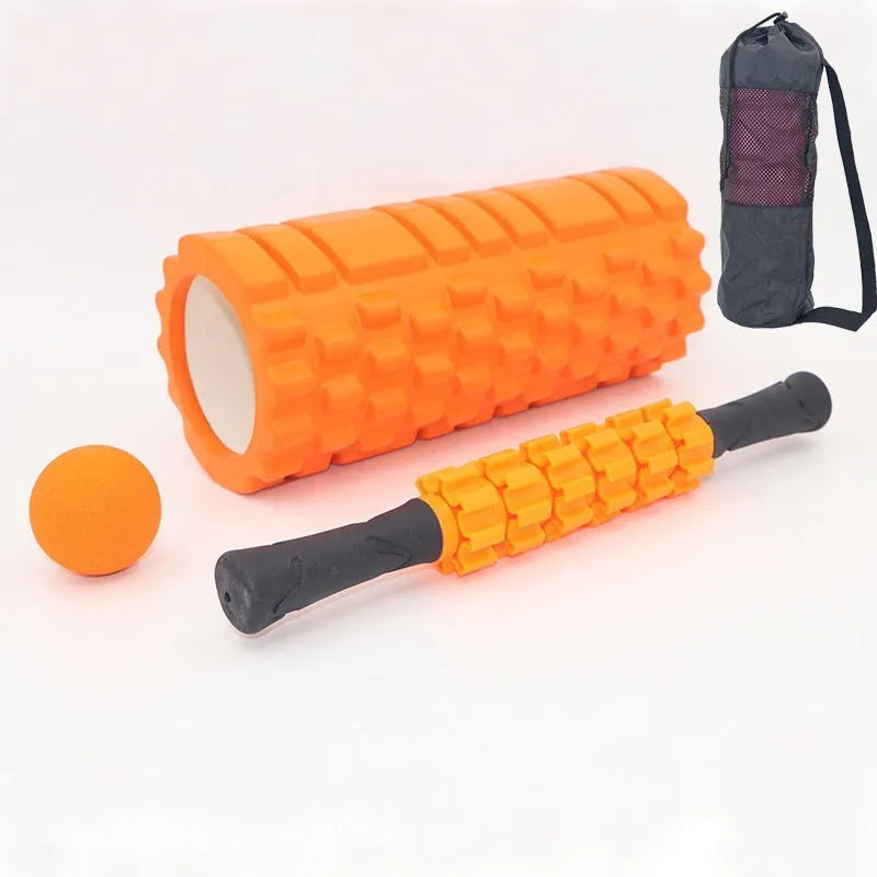 Black foam massage roller stick with six textured sections measuring 33cm long
