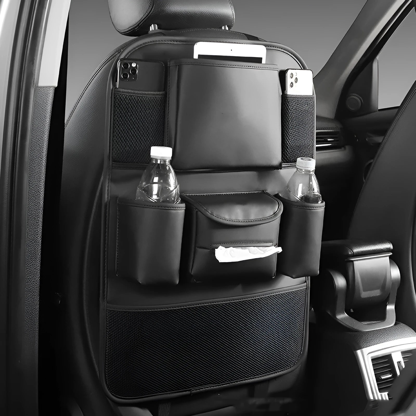 Leather car seat back storage bag in choice of four colours mounted behind vehicle seat