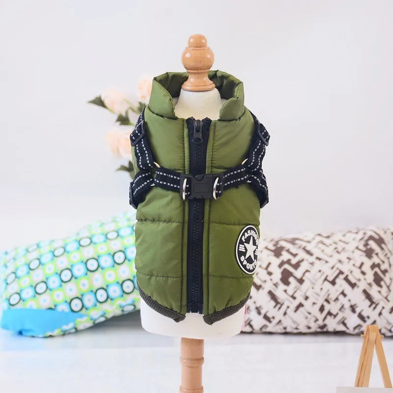 Red waterproof dog coat with integrated harness on a Labrador retriever