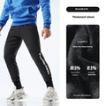 Men's black air layer ankle-tied sweatpants with mid waist design and polyester-spandex fabric
