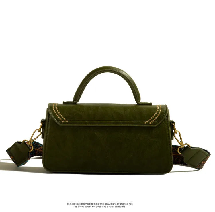 Retro textured women's messenger bag in PU leather with multiple internal pockets and shoulder strap