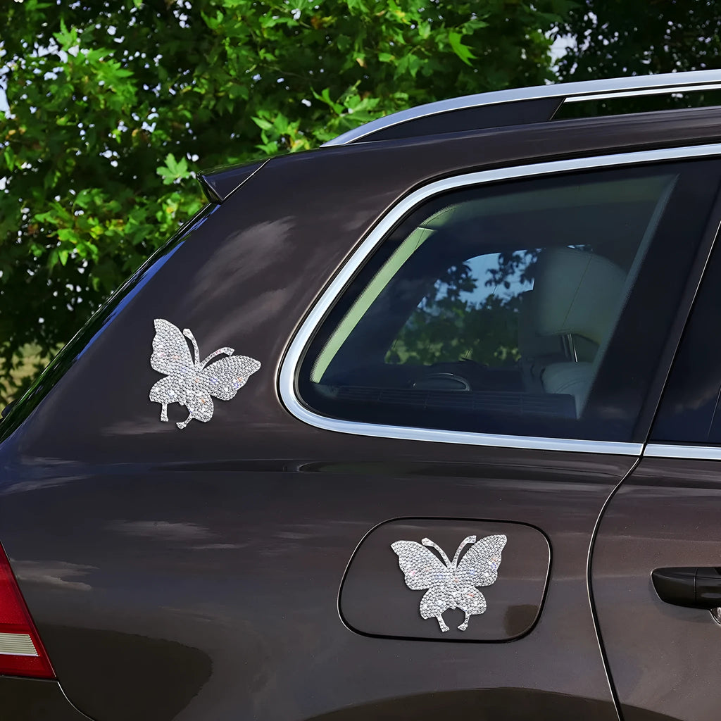 Diamond-encrusted glass car sticker with bear paw or butterfly design measuring 7 by 6 cm