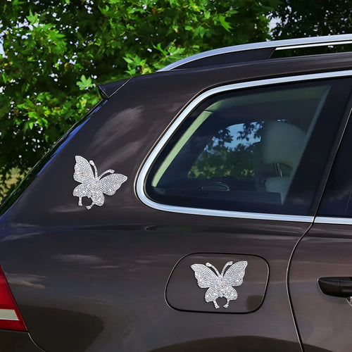 Diamond-encrusted glass car sticker with bear paw or butterfly design measuring 7 by 6 cm