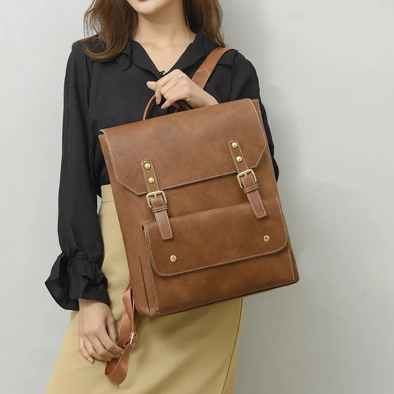 Korean style retro backpack in soft PU material shown in a dark brown colour.