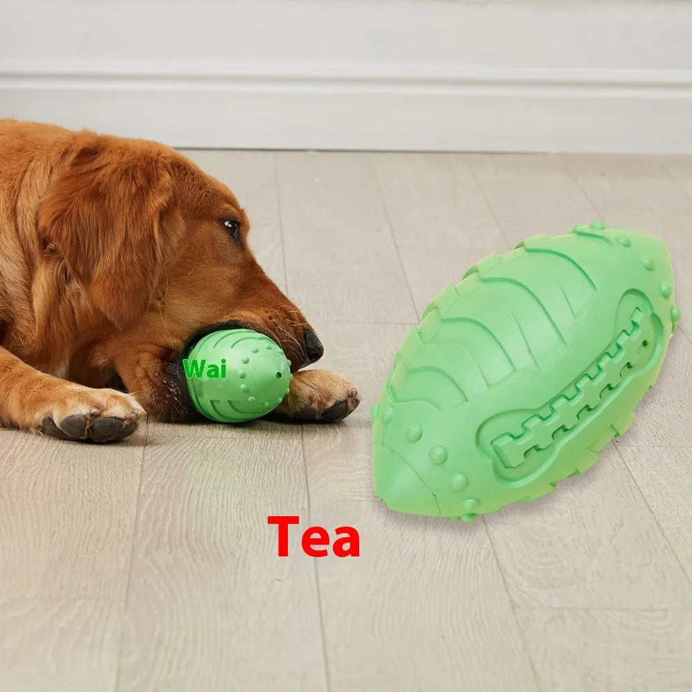Bite-resistant rubber dog training ball in rugby shape, light green colour, for aggressive chewers