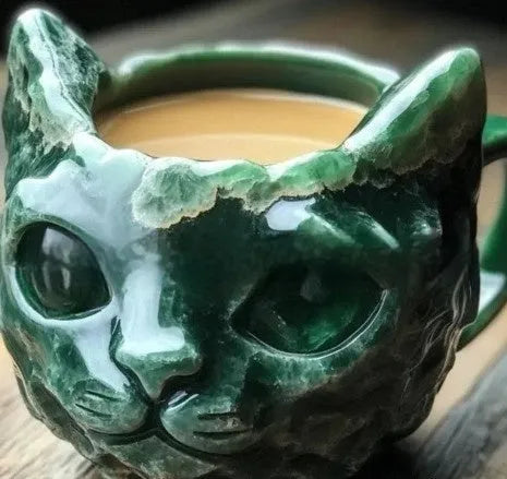 Purple geode crystal and cat decorative resin mug on a shelf.