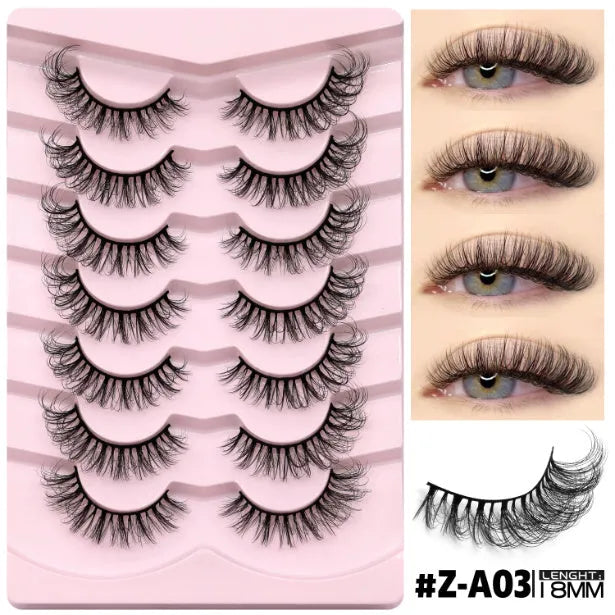 Box of natural style false eyelashes made from artificial fibre, includes adhesive glue