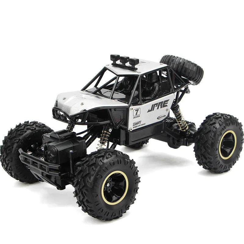 Large 4WD remote control climbing car with 2.4G wireless remote on off-road terrain