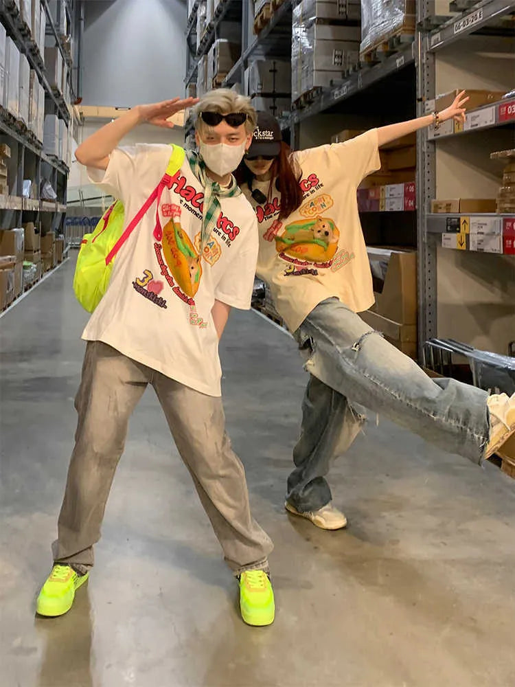 Loose fit white cotton T-shirt with a cartoon hamburger dog print on the front.