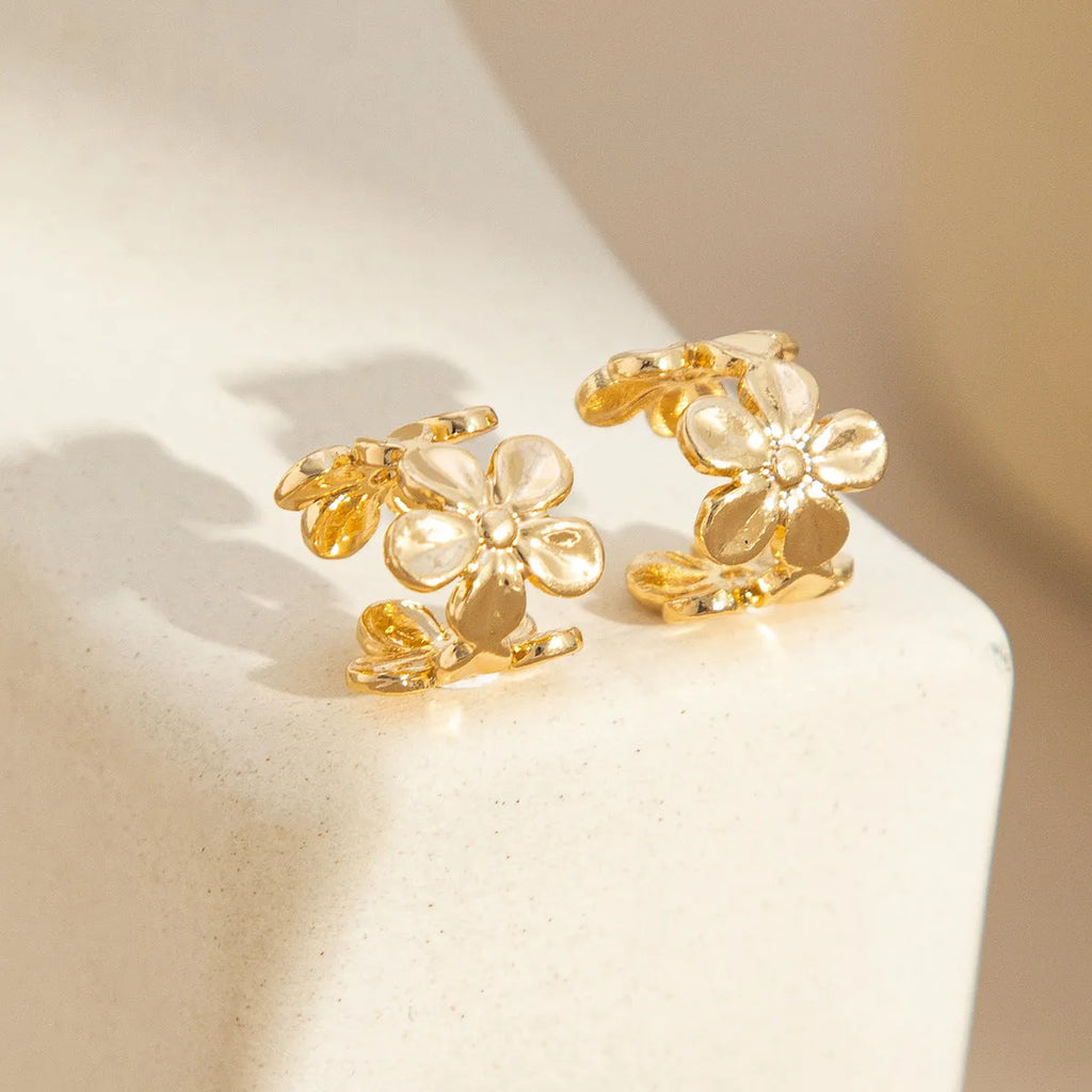 Gold starfish and scallop shell drop earrings with conch details for women