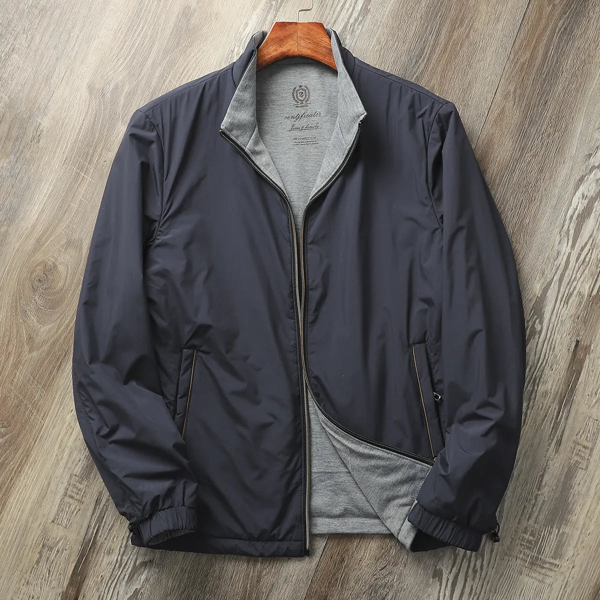 Men's stand collar business casual jacket in polyester cotton blend fabric showing regular fit and standard sleeves