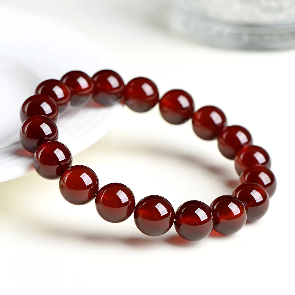 Natural orange red garnet crystal bracelet with Ruyi decorative elements in retro ball design