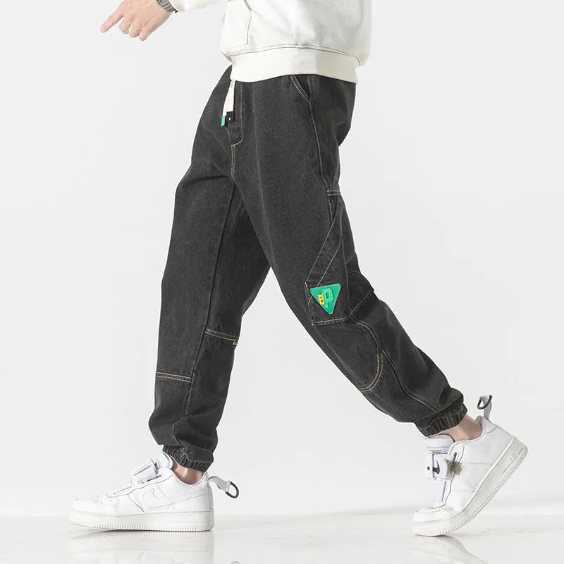 Men's cotton loose-fit tapered trousers in black, blue, or grey colours with mid-waist design