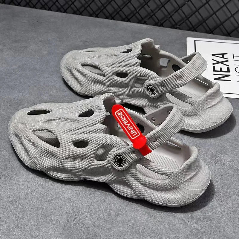 Men's grey EVA slippers with closed toe and breathable hole design on foot