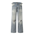 Blue wash straight-leg jeans with ripped detailing and zipper fly opening