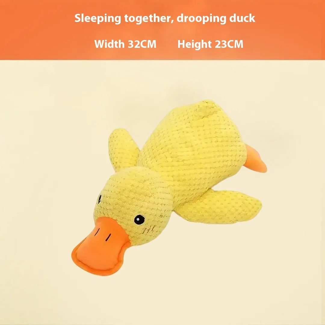 Assorted plush pet chew toys including a blue elephant, a duck, and a donkey in different colours