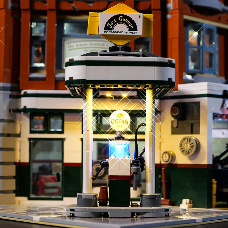 Plastic LED lighting kit components for a MOC model corner repair shop diorama.