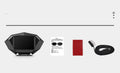P1 black vehicle head-up display unit with OBD cable on a car dashboard.