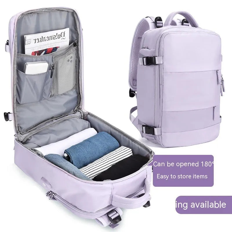 Large black waterproof nylon mummy backpack with zipped compartments.