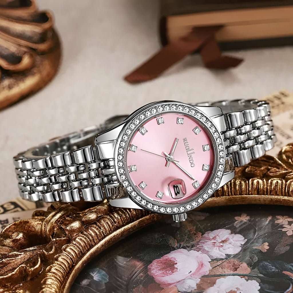 Women's silver alloy quartz calendar watch with round dial and stainless steel folding buckle.