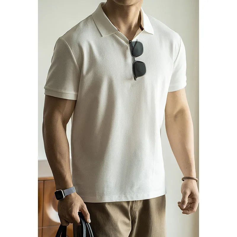 Blue short-sleeved cotton blend polo shirt for men on a hanger, showing regular fit and button placket.