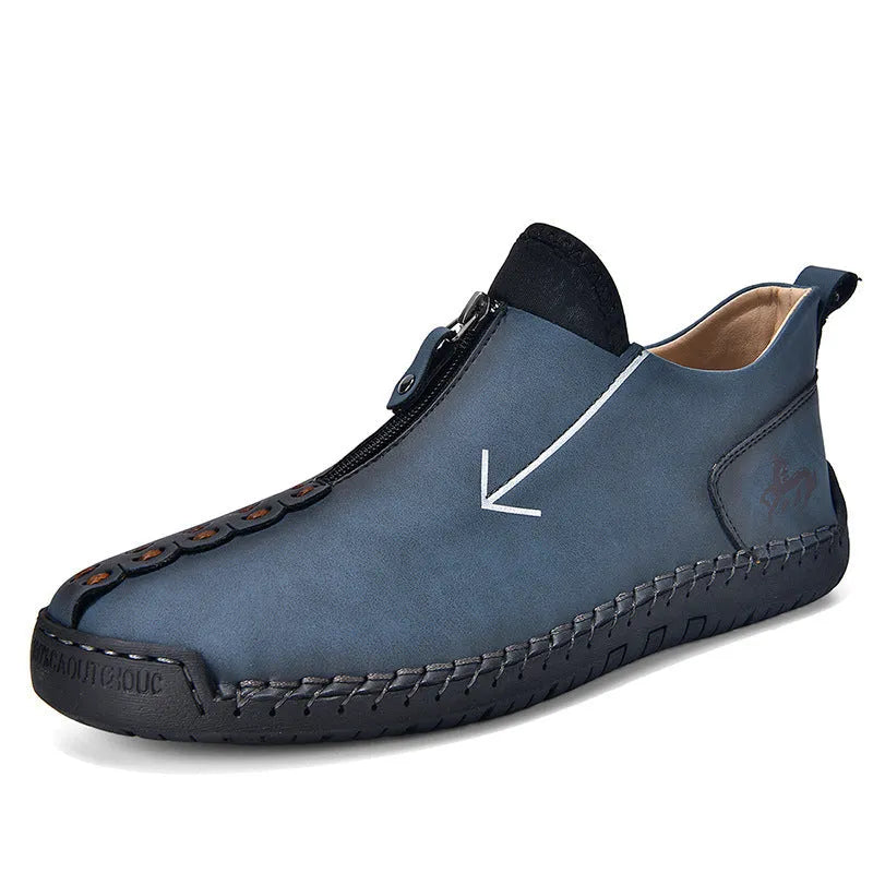Men's black casual ankle boots with a front zip closure and visible stitching detail