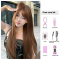 Warm brown long straight synthetic wig with bangs on display stand