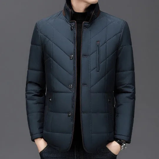 Men's solid colour winter short coat with side seam pockets, shown in dark blue.